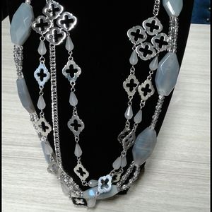 2 necklaces, 1 glass or stone beads,2 silver,beads